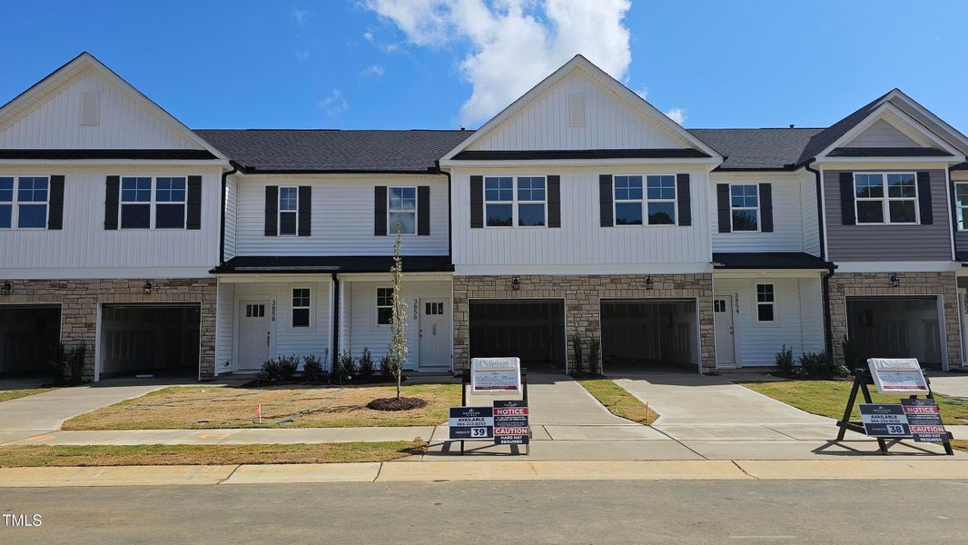 Front exterior of a new home in Springvale, Willow Spring, NC, highlighting curb appeal (Image 3). Front exterior of a new home in Springvale, Willow Spring, NC, highlighting curb appeal (Image 3).