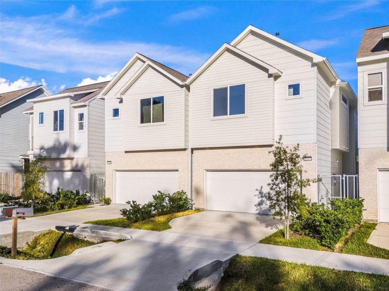 Contemporary two-story free-standing home by Parra Homes featuring first-floor living & a private driveway. Modern comfort & design in a prime location. Contemporary two-story free-standing home by Parra Homes featuring first-floor living & a private driveway. Modern comfort & design in a prime location.