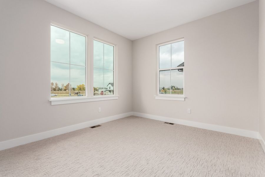 Spacious, unfurnished interior of a new home in West Grange, Longmont (Image 48).
