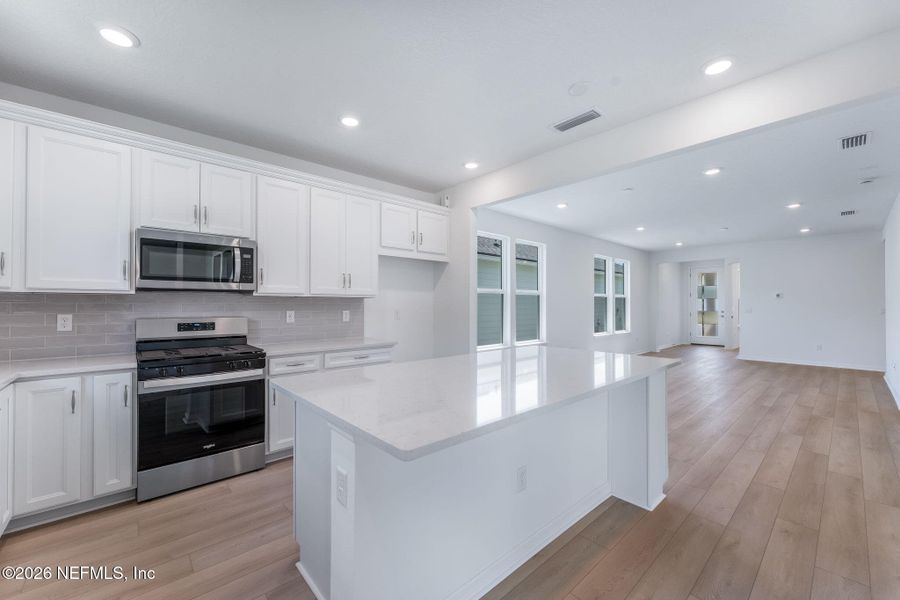 Furnished interior view inside a new home in Del Webb Wildlight, Yulee (Image 8).