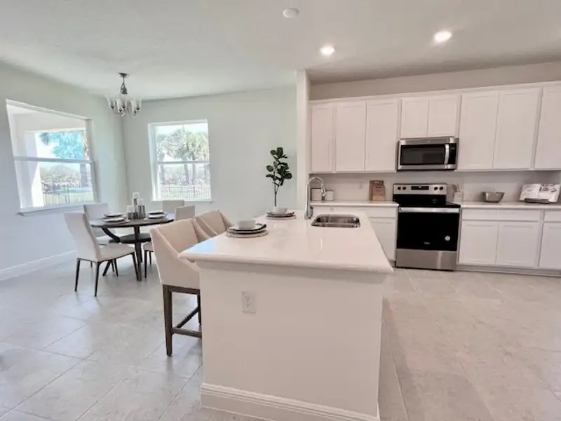 Furnished interior view inside a new home in Lakes At St Sebastian, Micco (Image 12).