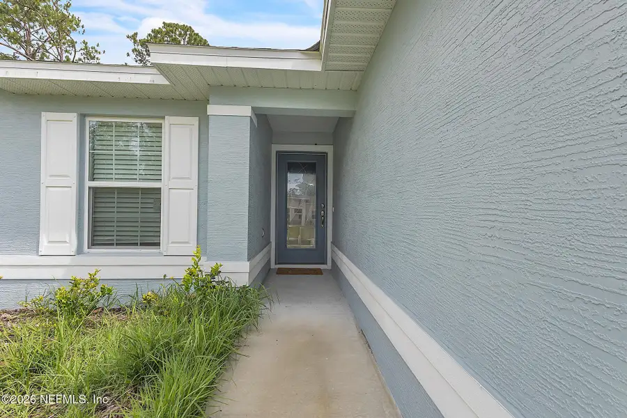 Exterior details and patio area of a home in , Palm Coast (Image 25).