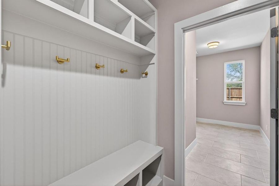 convenient mud room located between the garage entrance and the laundry room convenient mud room located between the garage entrance and the laundry room