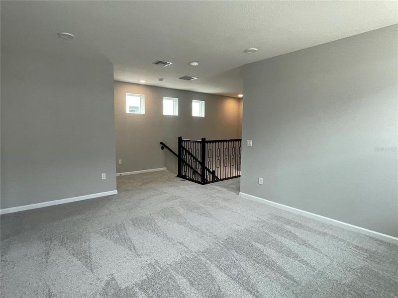 Spacious, unfurnished interior of a new home in Center Lake on the Park, St. Cloud (Image 38).
