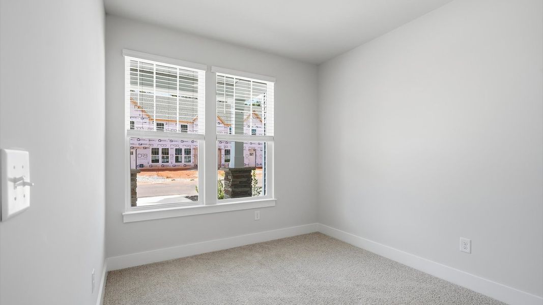 First-rate guest bedroom with plush carpeting and large windows that provide an open, airy feel near Downtown Anderson First-rate guest bedroom with plush carpeting and large windows that provide an open, airy feel near Downtown Anderson