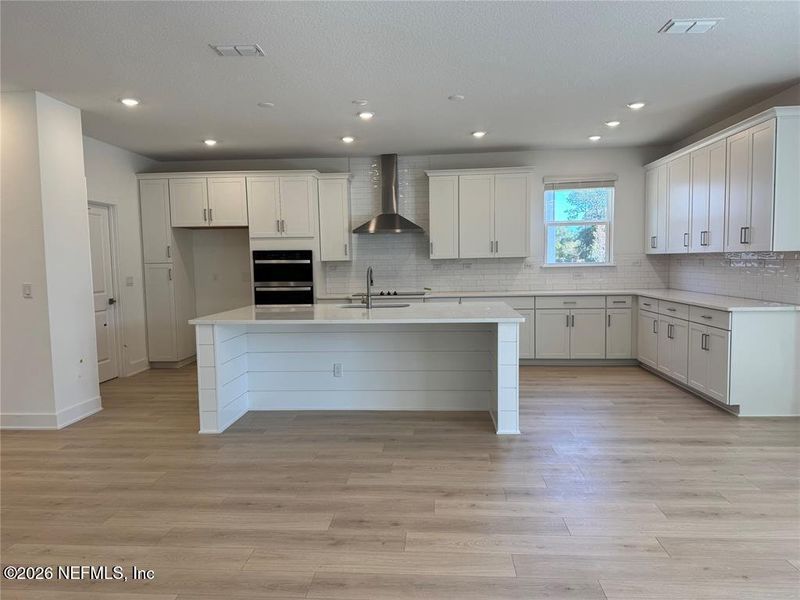 Furnished interior view inside a new home in Pirates Bluff, Yulee (Image 4).