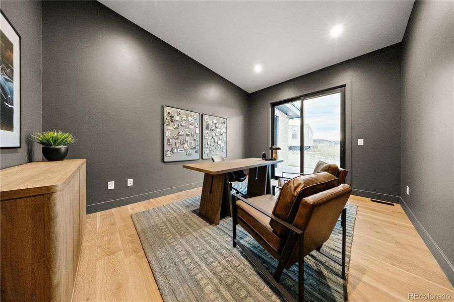 Furnished interior view inside a new home in Signature at Crystal Valley, Castle Rock (Image 4).