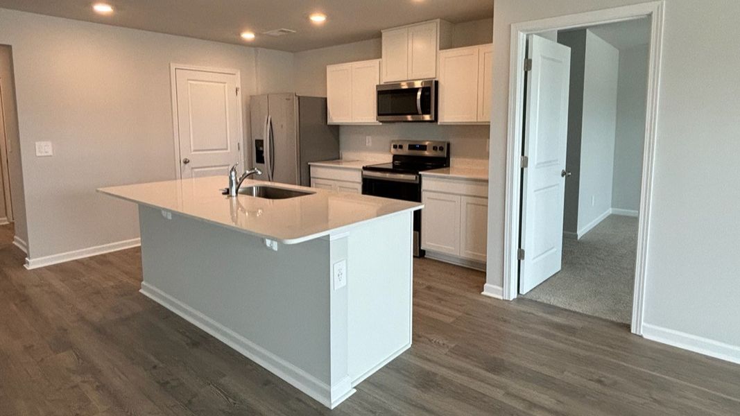 Furnished interior view inside a new home in The Parks, White House (Image 17).
