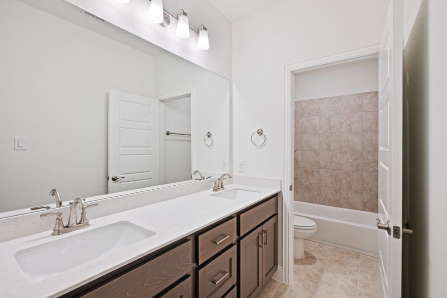 Furnished interior view inside a new home in Edgewater, Fate (Image 16).