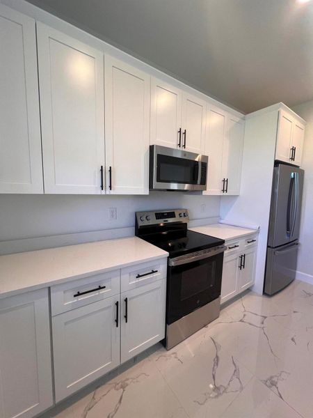 Furnished interior view inside a new home in , Port Charlotte (Image 7).