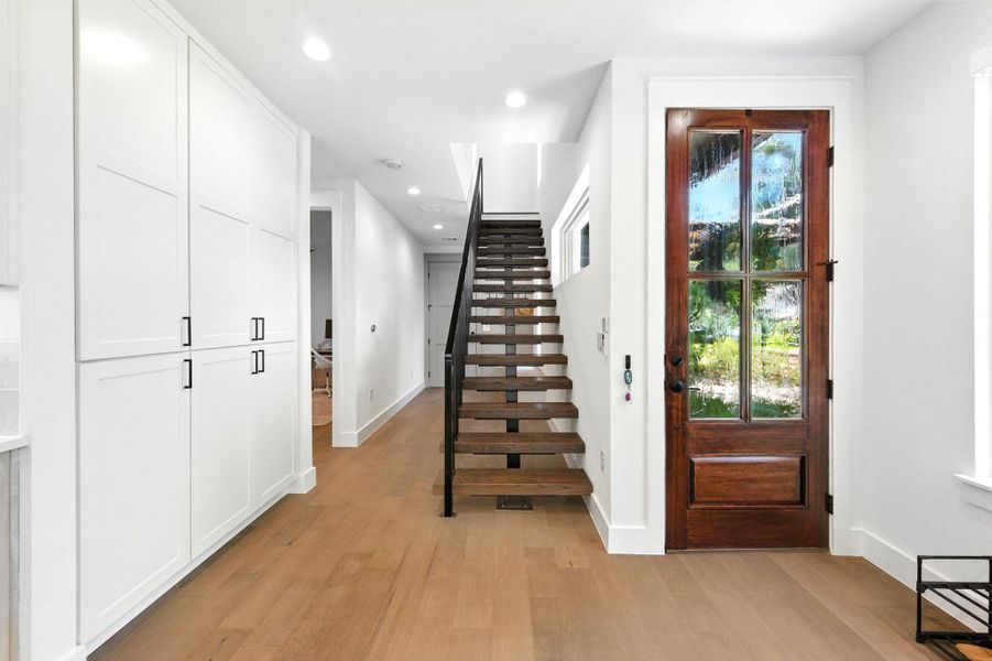 Entry, stairs, hall. On left is bedroom#1 and full bathroom #1 Entry, stairs, hall. On left is bedroom#1 and full bathroom #1