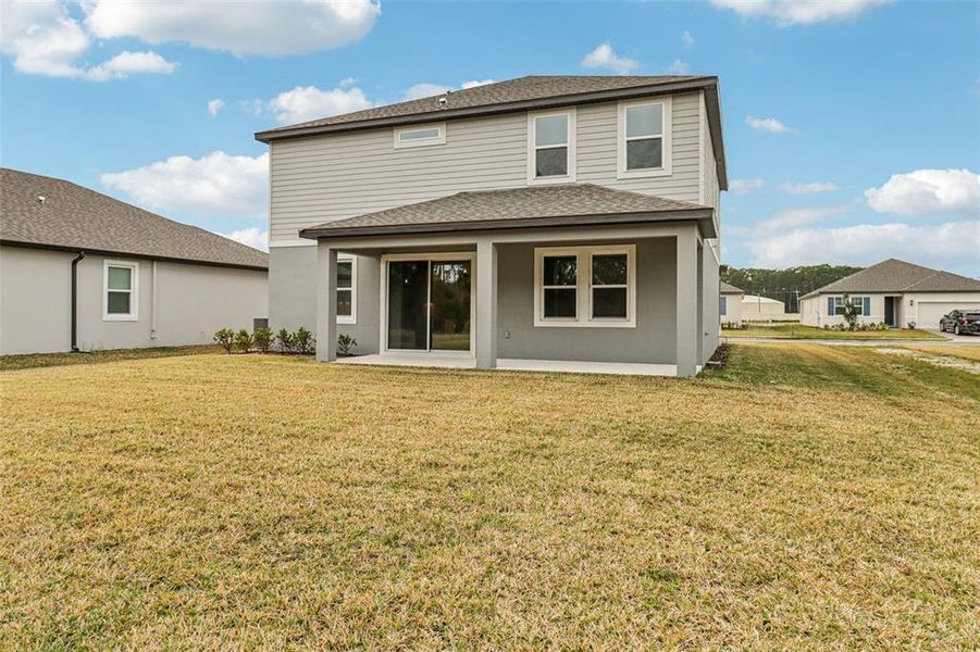 Exterior details and patio area of a home in Legends Preserve - Signature Series, Daytona Beach (Image 23).