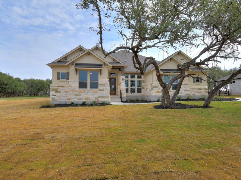 Representative exterior photo of a completed home built from the Siena II by Giddens Homes in Clearwater Ranch, Liberty Hill, TX (Image 34).