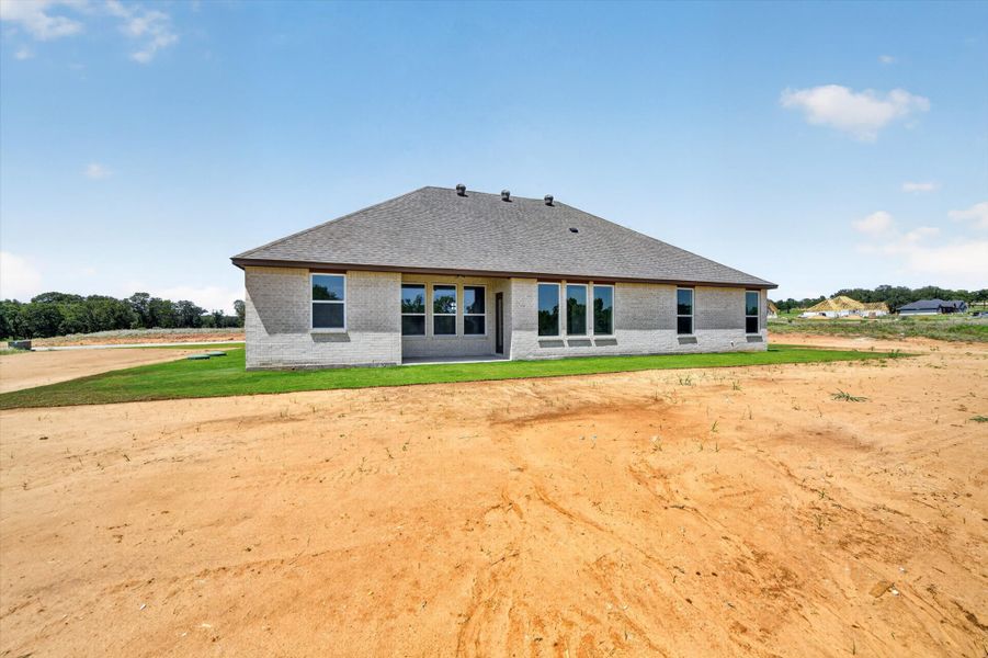 Exterior details and patio area of a home in Taylor Ranch, Springtown (Image 4).