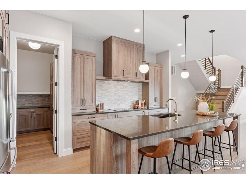 Furnished interior view inside a new home in Harvest LiteLuxe, Berthoud (Image 3).
