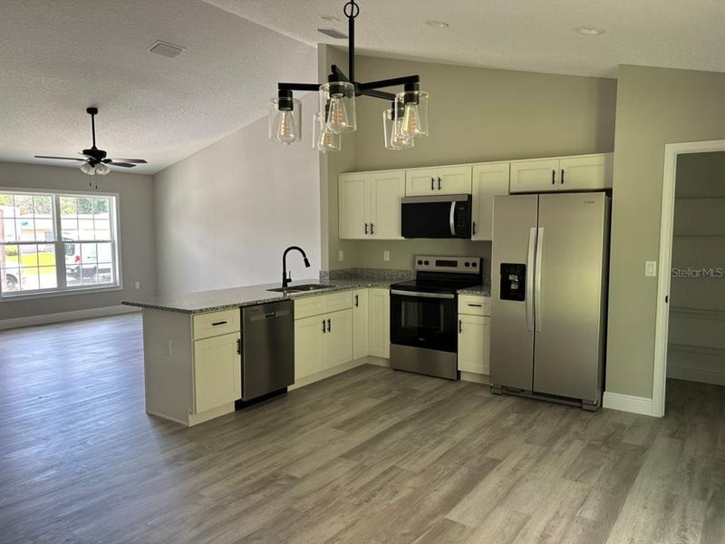 Furnished interior view inside a new home in , Dunnellon (Image 6).
