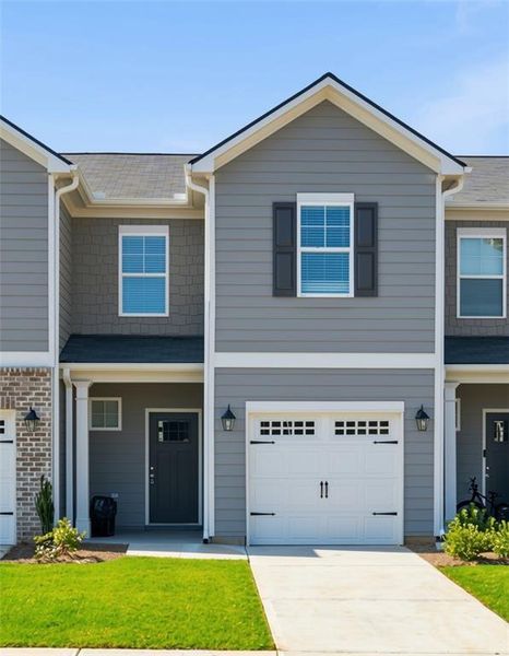 Front exterior of a new home in , Cartersville, GA, highlighting curb appeal (Image 1). Front exterior of a new home in , Cartersville, GA, highlighting curb appeal (Image 1).