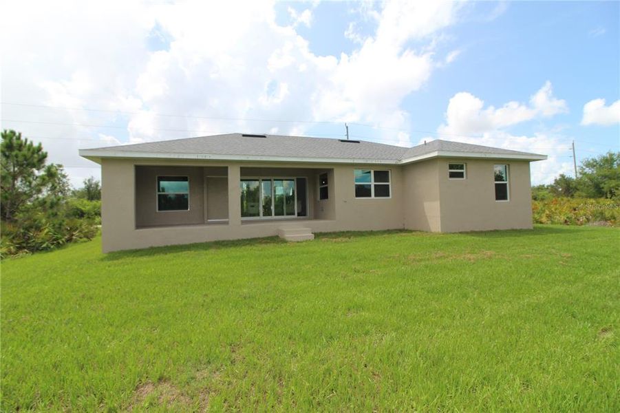 Exterior details and patio area of a home in , Port Charlotte (Image 27).
