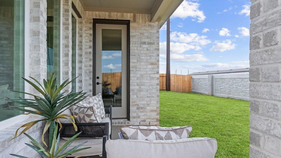 Outdoor covered patio with room for outdoor furniture to enjoy the backyard in those cooler months Outdoor covered patio with room for outdoor furniture to enjoy the backyard in those cooler months