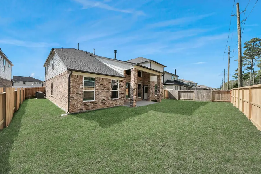 Come and see this spacious backyard with its beautiful covered patio. There is plenty of room for the kids to play and adults to relax. Perfect for your outdoor living space, patio furniture, bbq pit, and so much more. The possibilities are endless!