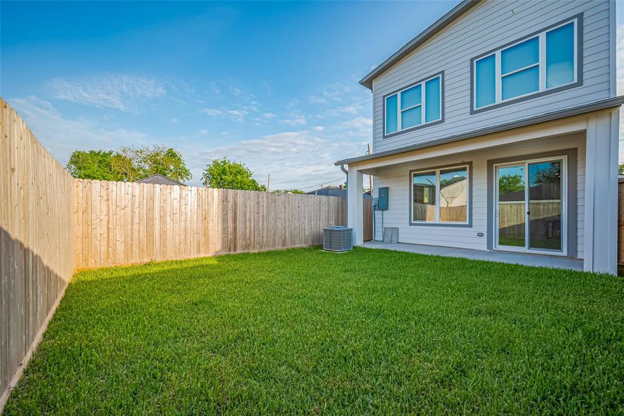 Exterior details and patio area of a home in , Houston (Image 3). Exterior details and patio area of a home in , Houston (Image 3).