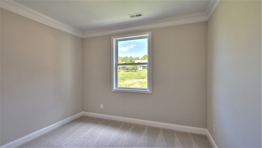 Representative unfurnished interior of a home built from the ARLINGTON DRHe by D.R. Horton in Valley View, Waynesville (Image 22).