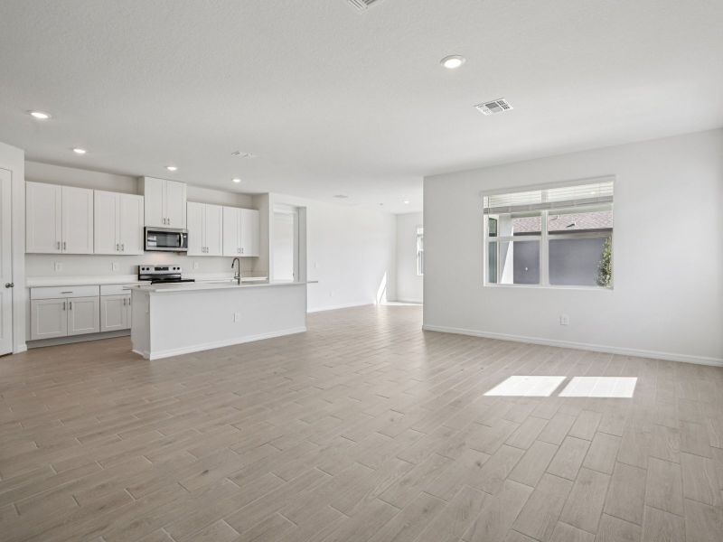 Spacious, unfurnished interior of a new home in Coasterra - Reserve Series, Palmetto (Image 9).