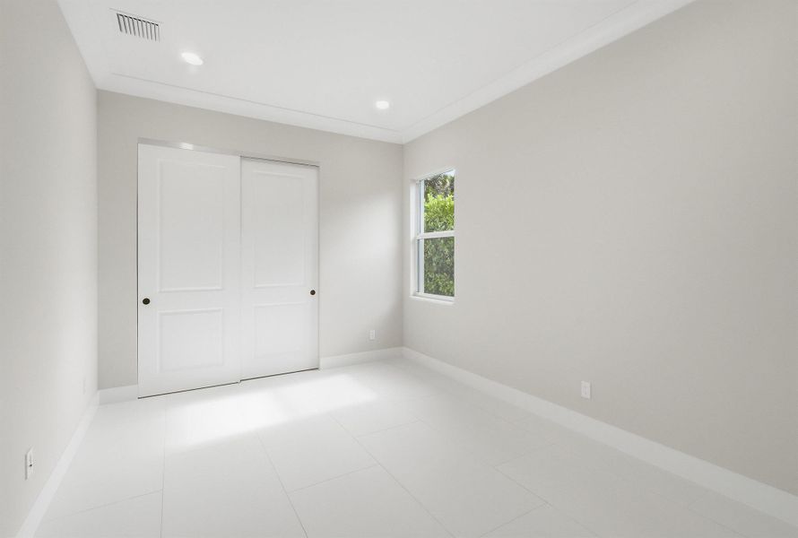 Furnished interior view inside a new home in The Strand, Vero Beach (Image 11).