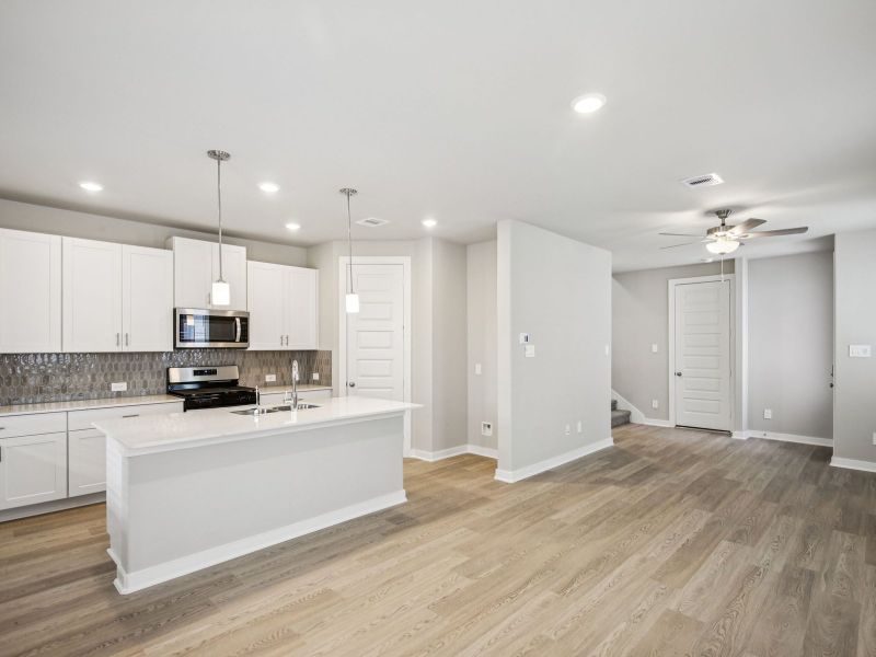 Furnished interior view inside a new home in Pinewood Trails - City Series, Atascocita (Image 4).