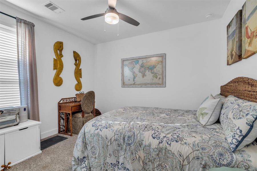 Furnished interior view inside a new home in , Conroe (Image 22).