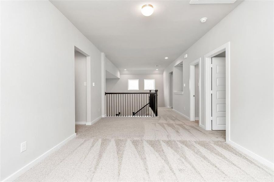 Another view of gameroom. Sample photo of completed home with similar floor plan. As-built interior colors and selections may vary