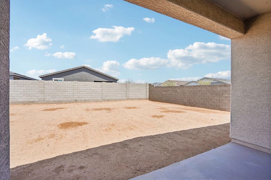 Covered patio to large backyard Covered patio to large backyard