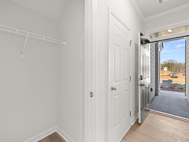 Spacious, unfurnished interior of a new home in Waypoint, Flowery Branch (Image 23).