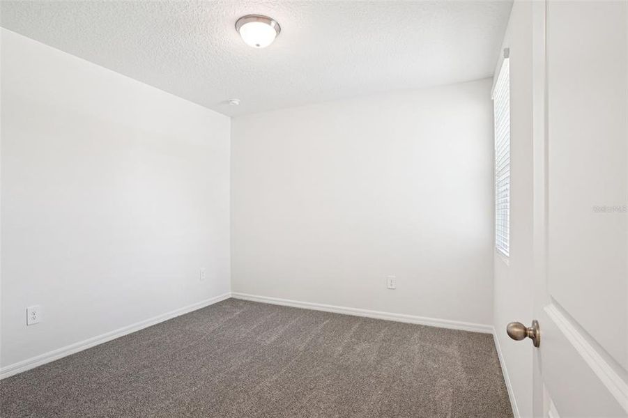 Spacious, unfurnished interior of a new home in Ridgehaven - Villas, Ormond Beach (Image 26).