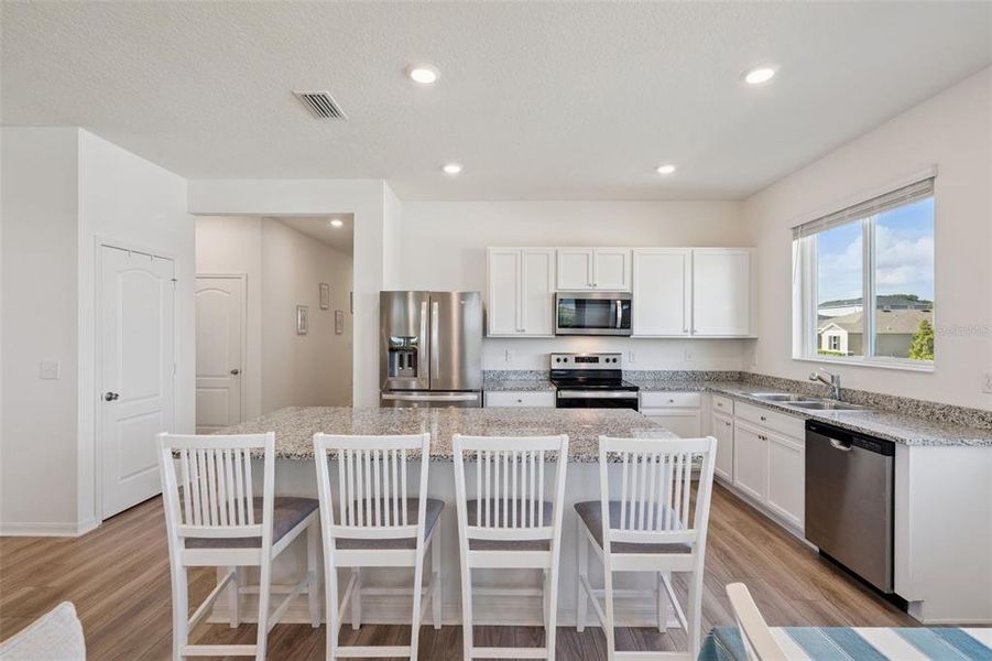 Furnished interior view inside a new home in , Mascotte (Image 44).