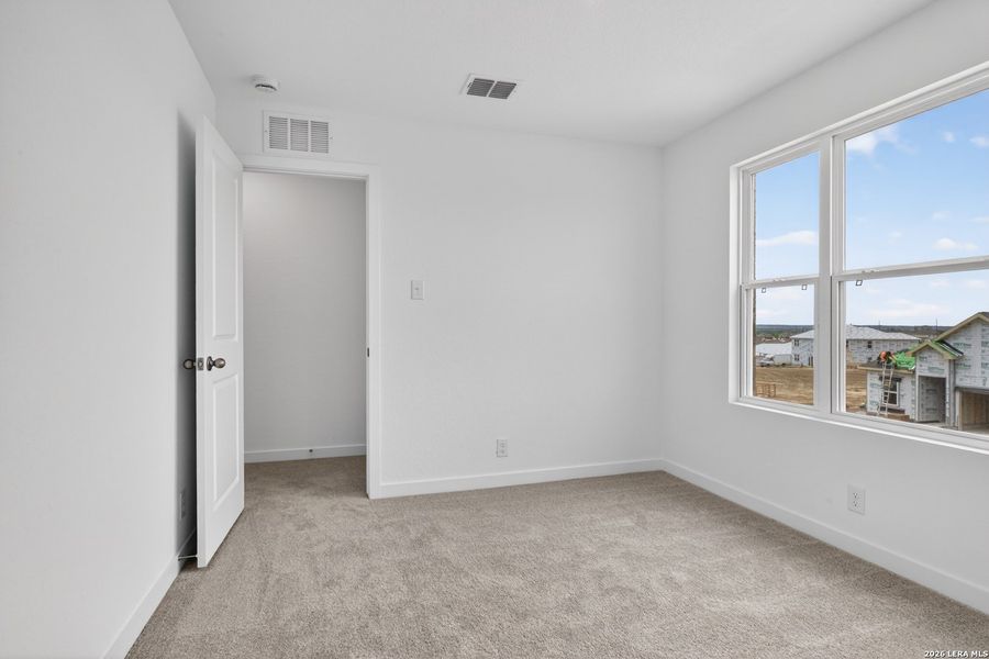 Spacious, unfurnished interior of a new home in The Wilder, Adkins (Image 16).