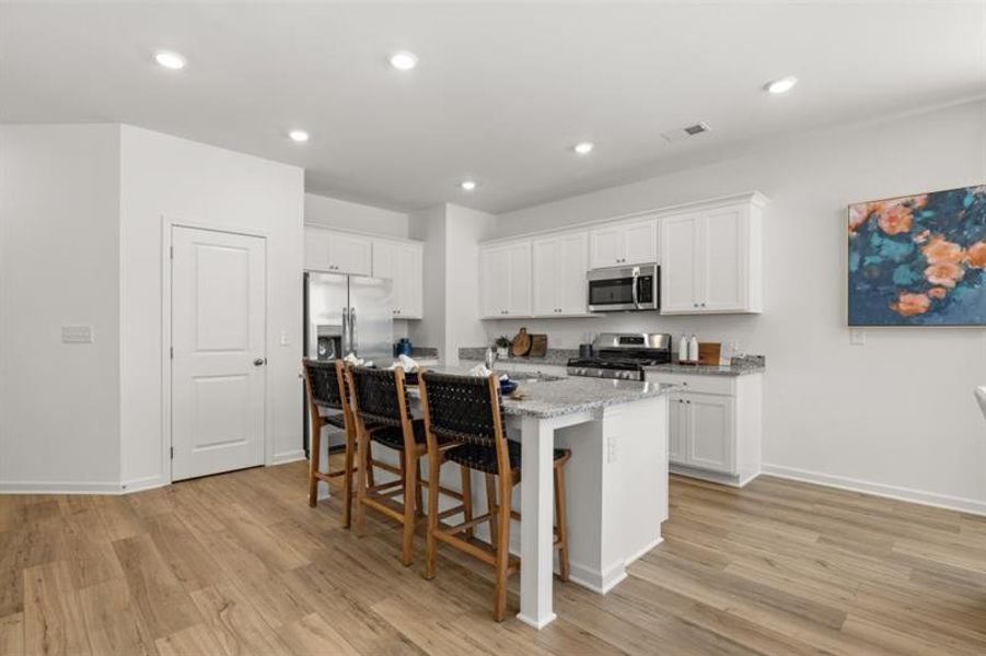 Furnished interior view inside a new home in Towns at Ivy Creek, Buford (Image 17).