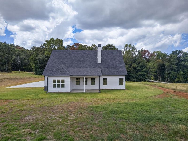 Exterior details and patio area of a home in Blackwelder Bluff, Bowdon (Image 35).