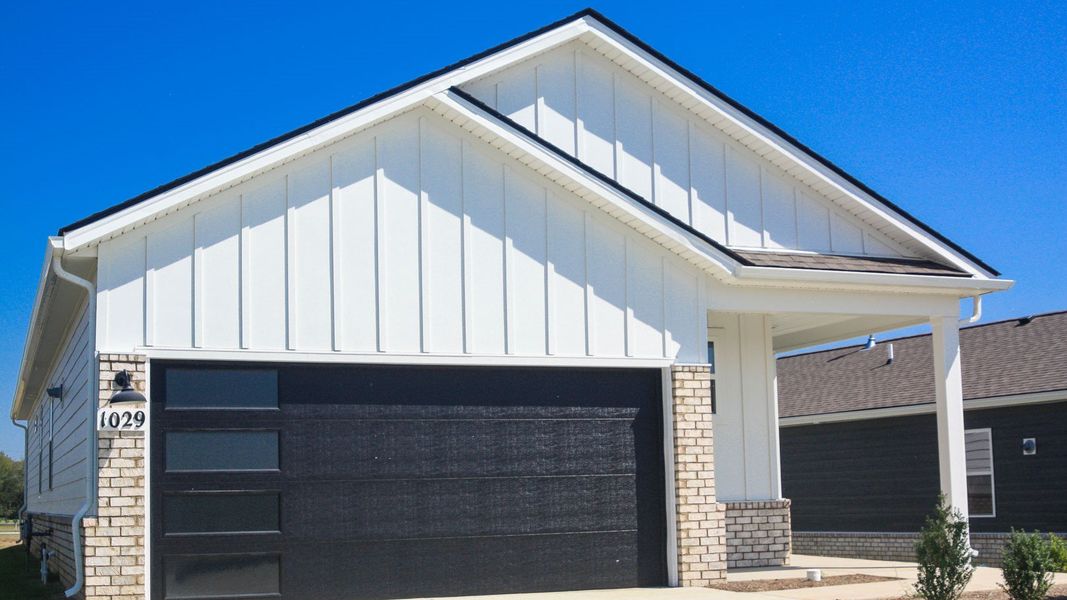 Front exterior of a new home in Nexus South, Gallatin, TN, highlighting curb appeal (Image 20). Front exterior of a new home in Nexus South, Gallatin, TN, highlighting curb appeal (Image 20).
