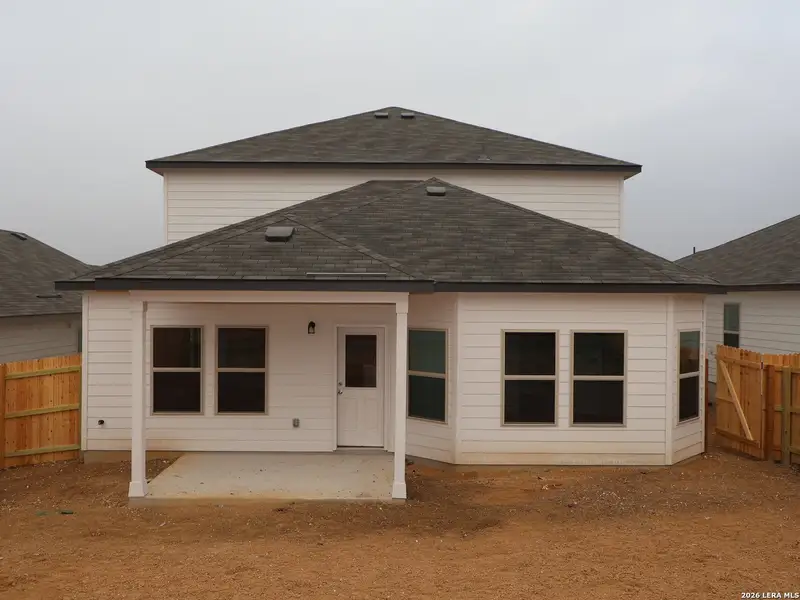 Exterior details and patio area of a home in Mesquite Ridge, San Antonio (Image 3).
