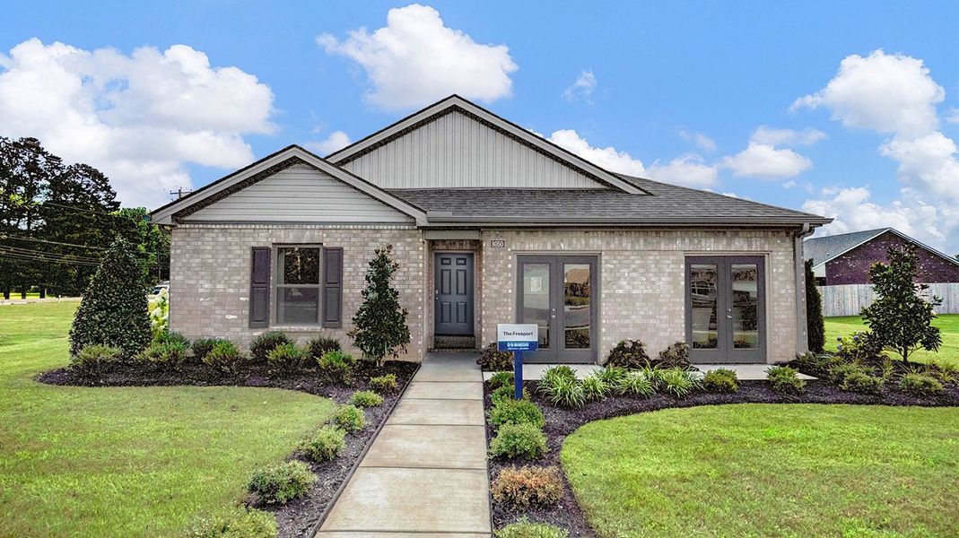 Front exterior of a new home in Huntington Estates, Millington, TN, highlighting curb appeal (Image 19).
