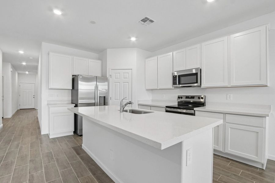 Kitchen. Representative images and renderings are for illustrative purposes. Actual structural options and design finishes of home may vary. Kitchen. Representative images and renderings are for illustrative purposes. Actual structural options and design finishes of home may vary.
