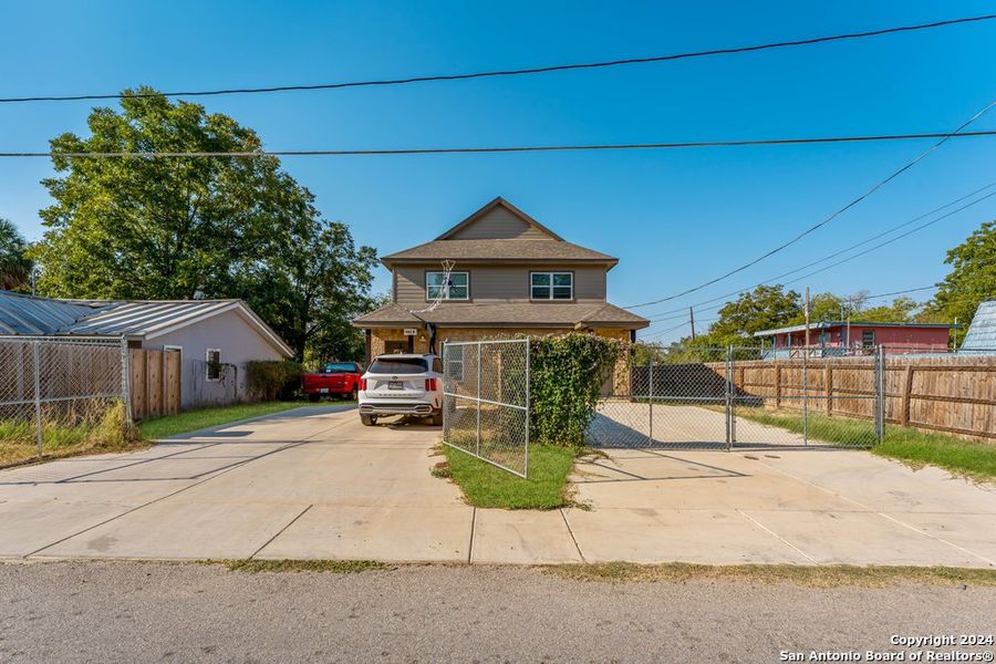 Front exterior of a new home in , Natalia, TX, highlighting curb appeal (Image 18).