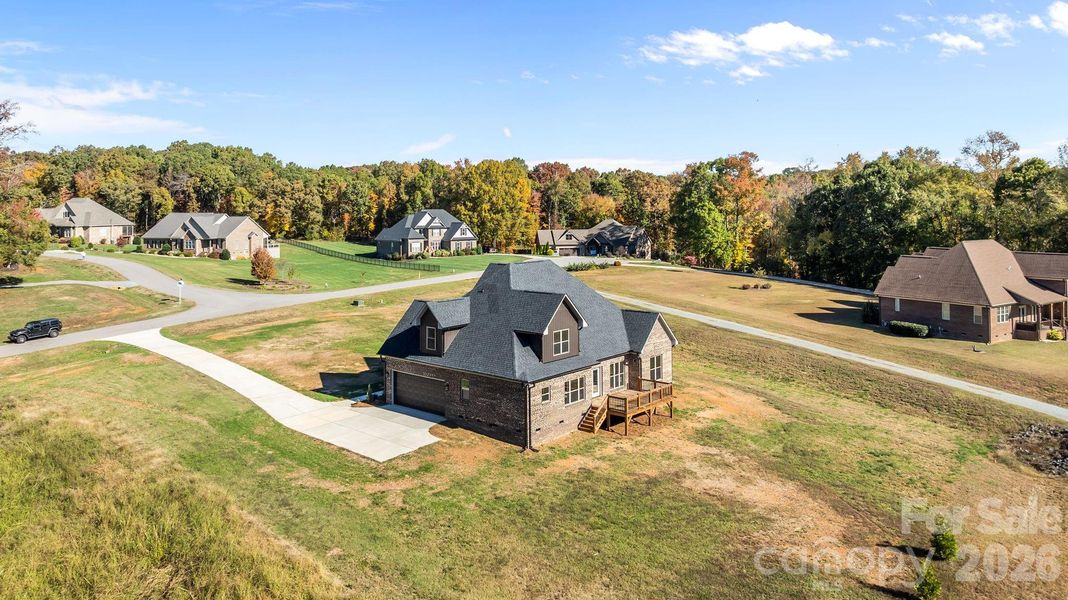 Front exterior of a new home in , Monroe, NC, highlighting curb appeal (Image 23).