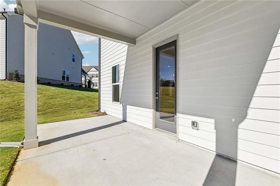 Exterior details and patio area of a home in East Harbor II at Chestatee, Dawsonville (Image 20).