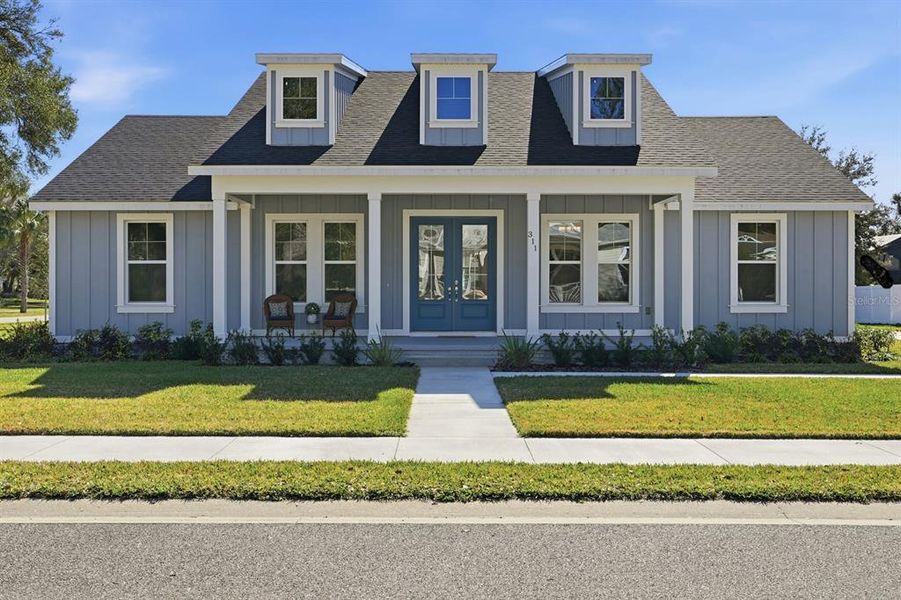 Front exterior of a new home in , Lake Helen, FL, highlighting curb appeal (Image 34).