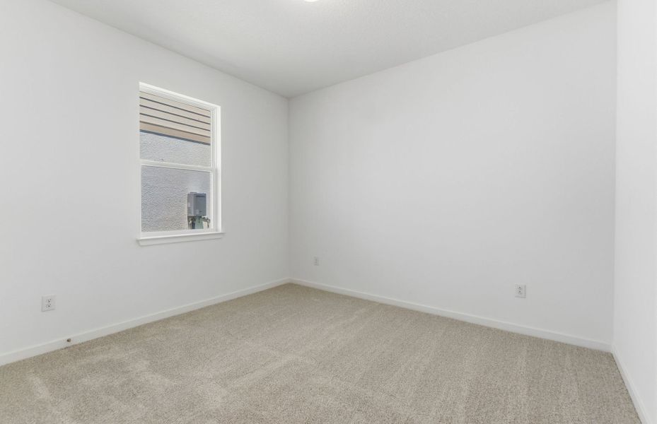 Spacious, unfurnished interior of a new home in Vida's Way, Wesley Chapel (Image 15).