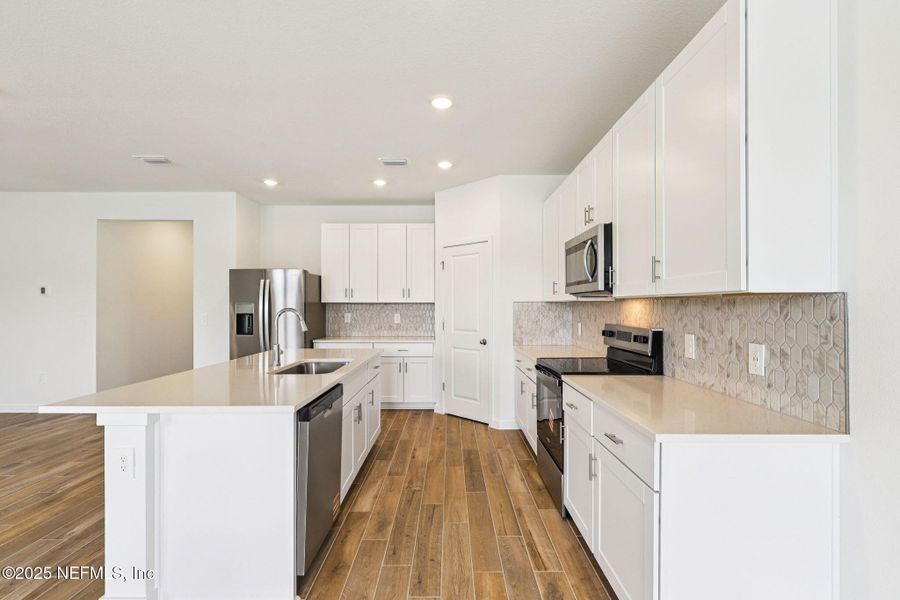 Furnished interior view inside a new home in Lakes at Bella Lago - Signature Series, Green Cove Springs (Image 6).