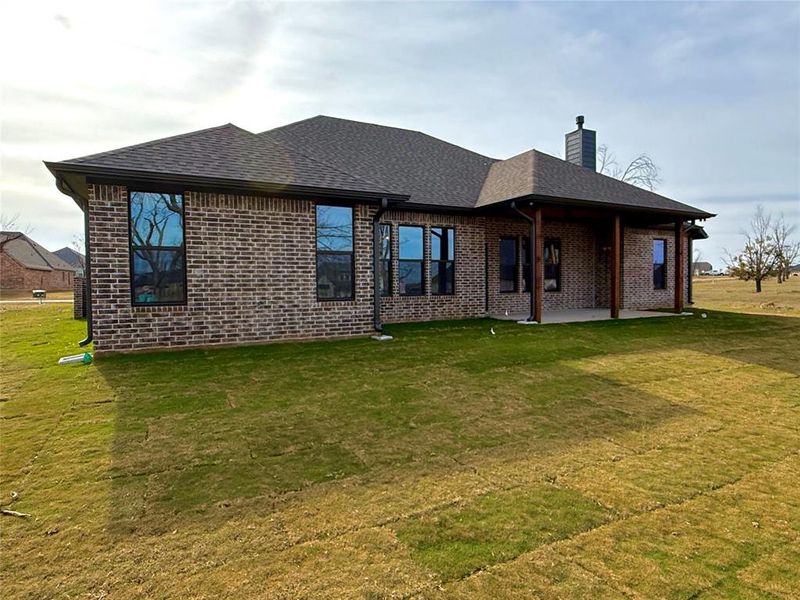 Exterior details and patio area of a home in , Granbury (Image 25).