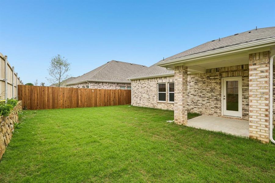 Exterior details and patio area of a home in Summerwood Estates, Red Oak (Image 4). Exterior details and patio area of a home in Summerwood Estates, Red Oak (Image 4).
